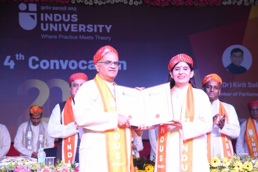 2 - Shrikant Talageri receiving D.Litt. from the President of Indus University, Mrs. Ritu Bhandari
